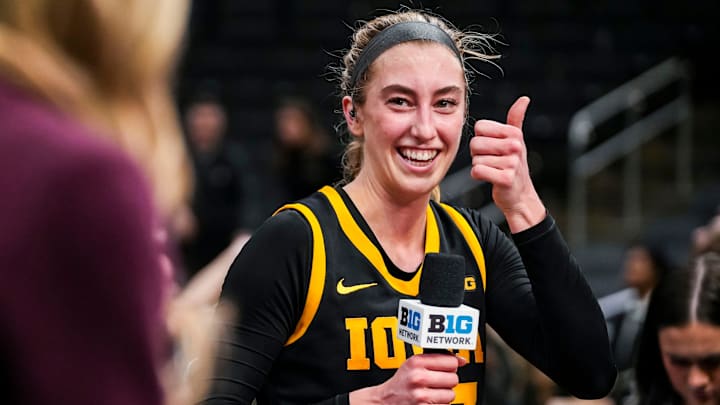 Iowa Hawkeyes guard Lucy Olsen (33) prepares for an interview Thursday, March 6, 2025, in a round two game at the 2025 TIAA Big Ten Women's Basketball Tournament between the Iowa Hawkeyes and the Michigan State Spartans at Gainbridge Fieldhouse in Indianapolis. The Hawkeyes defeated the Spartans, 74-61.