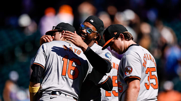 Sep 1, 2024; Denver, Colorado, USA; Baltimore Orioles designated hitter Eloy Jimenez (72) celebrates with third baseman Coby Mayo (16) and catcher Adley Rutschman (35) after the game against the Colorado Rockies at Coors Field.