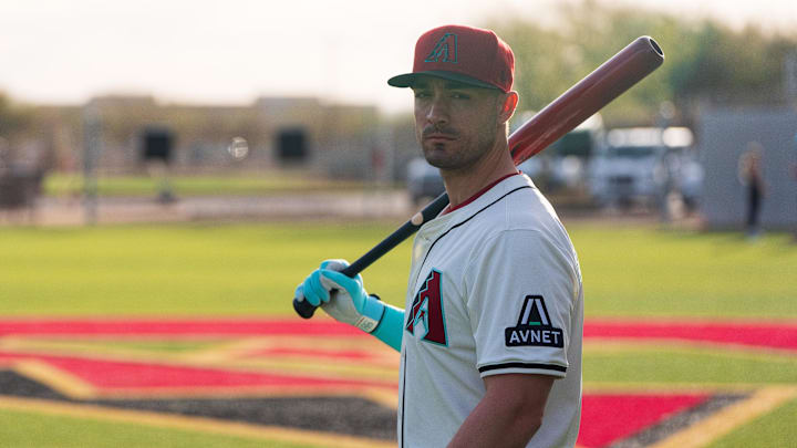Feb 19, 2025; Scottsdale, AZ, USA; Arizona Diamondbacks outfielder Randal Grichuk (15) poses for a portrait for MLB Media Day at Salt River Fields.  Mandatory Credit: Allan Henry-Imagn Images