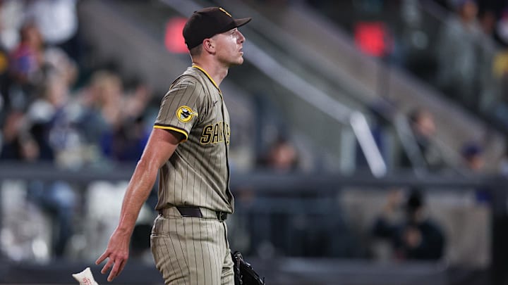 Sep 17, 2025; New York City, New York, USA; San Diego Padres starting pitcher Nick Pivetta (27) reacts after allowing a solo home run to New York Mets designated hitter Starling Marte (not pictured) during the fourth inning at Citi Field. Mandatory Credit: Vincent Carchietta-Imagn Images