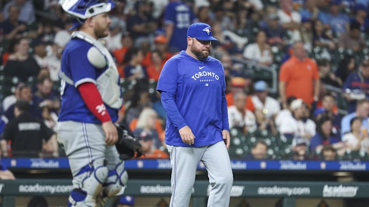 Apr 1, 2024; Houston, Texas, USA; Toronto Blue Jays manager John Schneider walks to the mound 