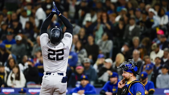 Sep 17, 2024; Seattle, Washington, USA; New York Yankees right fielder Juan Soto (22) celebrates a two-run home run against the Seattle Mariners during the fourth inning at T-Mobile Park. Seattle Mariners catcher Cal Raleigh (29) reacts at right. Mandatory Credit: Joe Nicholson-Imagn Images