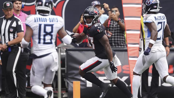Sep 28, 2025; Houston, Texas, USA; Houston Texans running back Woody Marks (27) runs with the ball and scores a touchdown during the fourth quarter against the Tennessee Titans at NRG Stadium. Mandatory Credit: Troy Taormina-Imagn Images Sep 28, 2025; Houston, Texas, USA; Houston Texans running back Woody Marks (27) runs with the ball and scores a touchdown during the fourth quarter against the Tennessee Titans at NRG Stadium. Mandatory Credit: Troy Taormina-Imagn Images