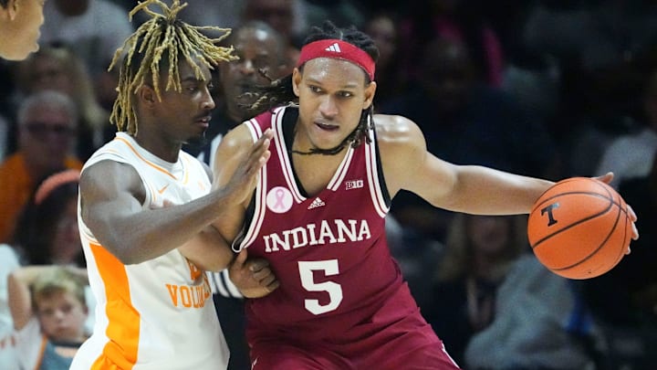 Indiana's Malik Reneau (5) backs down Tennessee'sJahmai Mashack (15) during an exhibition game in Knoxville. Tenn.