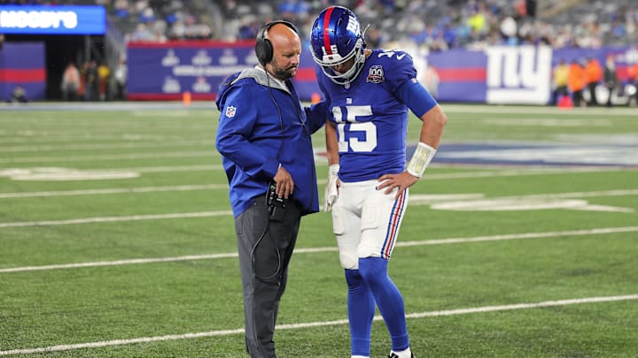 New York Giants quarterback Tommy DeVito (15)  with New York Giants head coach Brian Daboll.