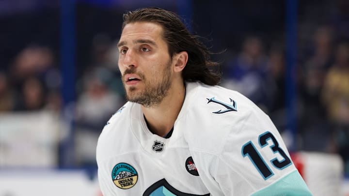 Feb 23, 2025; Tampa, Florida, USA; Seattle Kraken left wing Brandon Tanev (13) warms up before a game against the Tampa Bay Lightning at Amalie Arena. Mandatory Credit: Nathan Ray Seebeck-Imagn Images