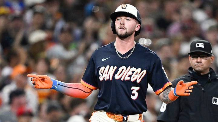Aug 7, 2026; San Diego, California, USA; San Diego Padres center fielder Jackson Merrill (3) gestures after hitting a  triple during the fourth inning against the Houston Astros at Petco Park. Mandatory Credit: Denis Poroy-Imagn Images