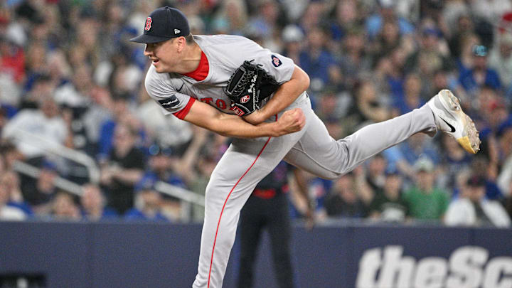 Jun 17, 2024; Toronto, Ontario, CAN;  Boston Red Sox relief pitcher Brad Keller (46) delivers a pitch against the Toronto Blue Jays in the ninth inning at Rogers Centre.