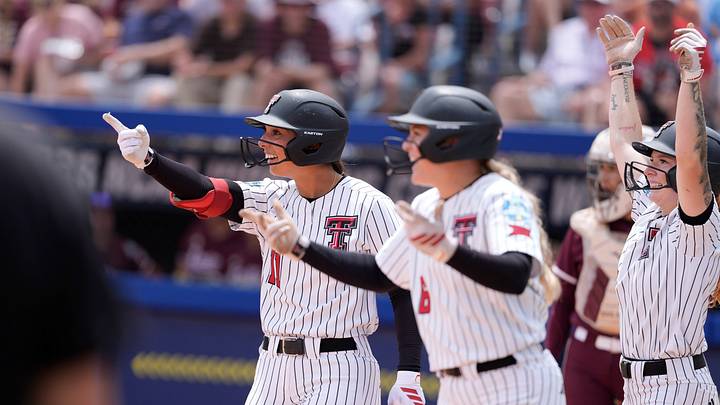 Texas Tech Red Raiders infielder Lauren Allred (11) celebrates as Texas Tech gets a run-rule victory during a Women's College World Series softball game between the Texas Tech Red Raiders and the Mississippi State Bulldogs at Devon Park in Oklahoma City, Thursday, May 28, 2026. Texas Tech won 8-0. Texas Tech Red Raiders infielder Lauren Allred (11) celebrates as Texas Tech gets a run-rule victory during a Women's College World Series softball game between the Texas Tech Red Raiders and the Mississippi State Bulldogs at Devon Park in Oklahoma City, Thursday, May 28, 2026. Texas Tech won 8-0.