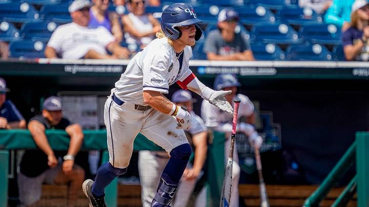Jun 20, 2023; Omaha, NE, USA; Oral Roberts Golden Eagles center fielder Jonah Cox (7) runs to first base after hitting a RBI single against the TCU Horned Frogs during the fifth inning at Charles Schwab Field Omaha. Mandatory Credit: Dylan Widger-Imagn Images