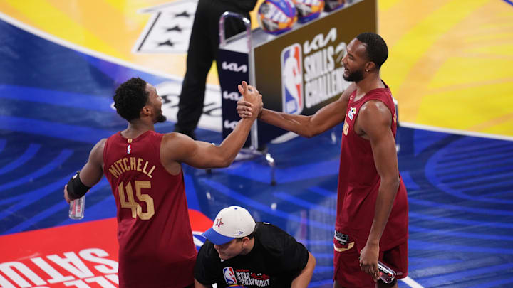 Feb 15, 2025; San Francisco, CA, USA; Team Cavs guard Donovan Mitchell (45) and center Evan Mobley (4) of the Cleveland Cavaliers celebrate after winning the skills challenge during All Star Saturday Night ahead of the 2025 NBA All Star Game at Chase Center. Mandatory Credit: Cary Edmondson-Imagn Images