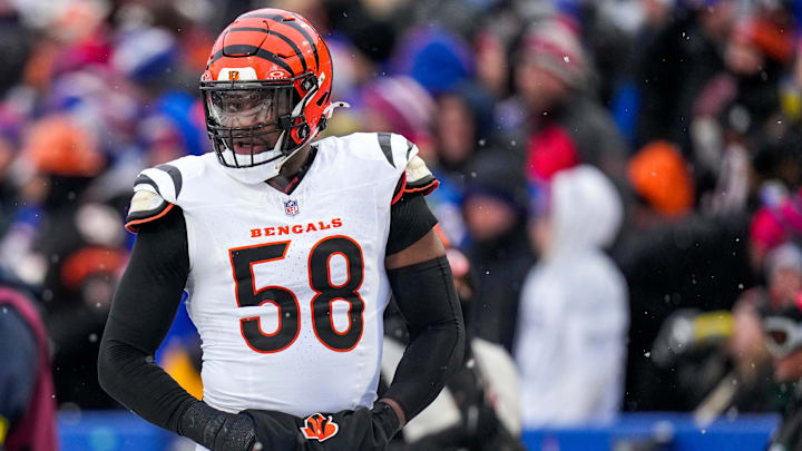 Cincinnati Bengals defensive end Joseph Ossai (58) walks for the locker room with trainers in the fourth quarter of the NFL Week 14 game between the Buffalo Bills and the Cincinnati Bengals.