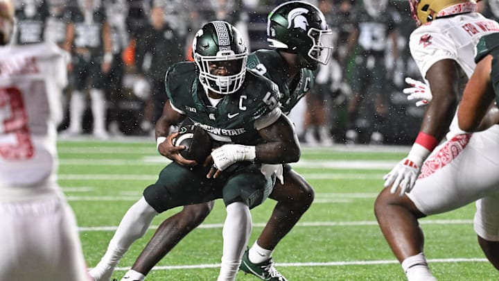 Sep 21, 2024; Chestnut Hill, Massachusetts, USA; Michigan State Spartans running back Nate Carter (5) runs the ball against the Boston College Eagles during the first half at Alumni Stadium. Mandatory Credit: Eric Canha-Imagn Images