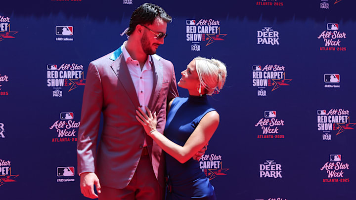 Jul 15, 2025; Atlanta, GA, USA; National League pitcher Paul Skenes (30) of the Pittsburgh Pirates and social media influencer Livvy Dunne pose for a photo on the red carpet before the 2025 MLB All Star Game at Truist Park. Mandatory Credit: Brett Davis-Imagn Images