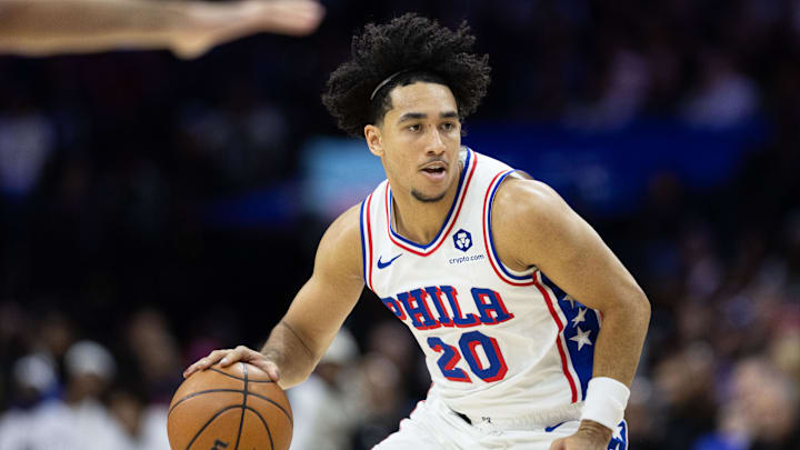Nov 2, 2024; Philadelphia, Pennsylvania, USA; Philadelphia 76ers guard Jared McCain (20) dribbles the ball against the Memphis Grizzlies during the second quarter at Wells Fargo Center. Mandatory Credit: Bill Streicher-Imagn Images