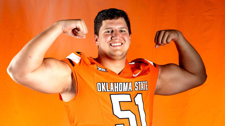 Oklahoma State offensive lineman Austin Kawecki poses for a photograph during the Oklahoma State Cowboys football media days in Gallagher-Iba Arena in Stillwater, Oklahoma, Saturday, Aug., 2, 2025. Oklahoma State offensive lineman Austin Kawecki poses for a photograph during the Oklahoma State Cowboys football media days in Gallagher-Iba Arena in Stillwater, Oklahoma, Saturday, Aug., 2, 2025.