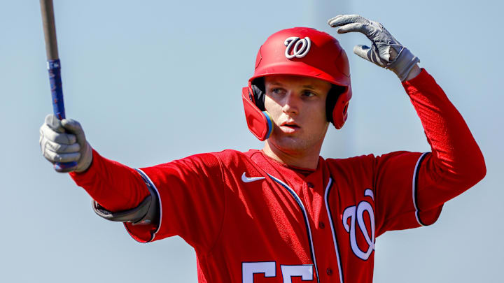 Feb 20, 2023; West Palm Beach, FL, USA; Washington Nationals outfielder Robert Hassell III (55) practices his swing during a spring training workout at The Ballpark of the Palm Beaches.