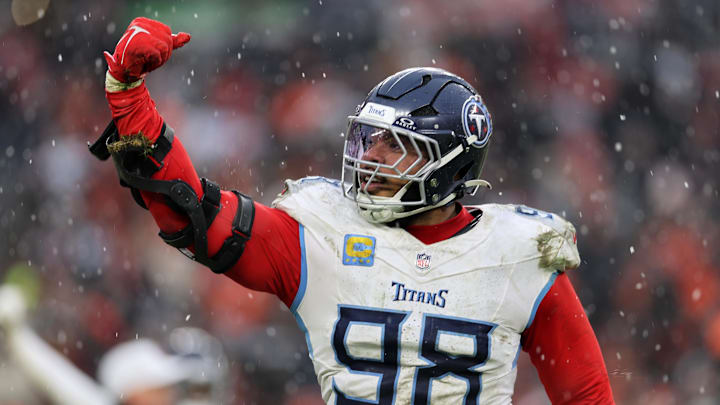 Dec 7, 2025; Cleveland, Ohio, USA; Tennessee Titans defensive tackle Jeffery Simmons (98) reacts after sacking Cleveland Browns quarterback Shedeur Sanders (not pictured) during the fourth quarter at Huntington Bank Field. Mandatory Credit: Scott Galvin-Imagn Images