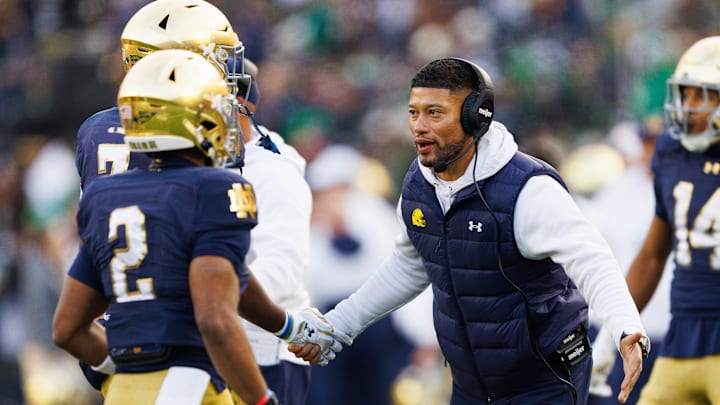 Notre Dame head coach Marcus Freeman celebrates after a touchdown in the first half of a NCAA football game against Syracuse at Notre Dame Stadium on Saturday, Nov. 22, 2025, in South Bend.