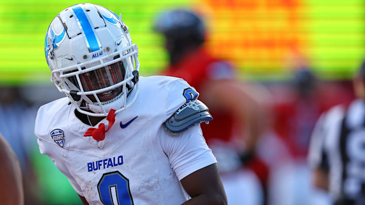 Sep 21, 2024; DeKalb, Illinois, USA; Buffalo Bulls wide receiver Victor Snow (0) reacts after a touchdown catch against the Northern Illinois Huskies during the second half at Huskie Stadium. Mandatory Credit: Mike Dinovo-Imagn Images