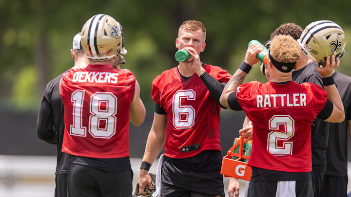 Jun 10, 2025; New Orleans, LA, USA;  New Orleans Saints quarterback Tyler Shough (6) and quarterback Spencer Rattler (2) and quarterback Hunter Dekkers (18) take a water break during minicamp at Ochsner Sports Performance Center. Mandatory Credit: Stephen Lew-Imagn Images