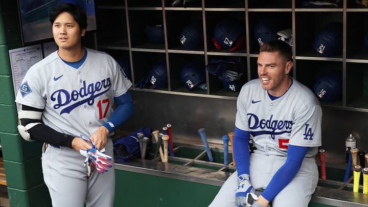 Jun 9, 2026; Pittsburgh, Pennsylvania, USA;  Los Angeles Dodgers designated hitter Shohei Ohtani (17) and first baseman Freddie Freeman (5) prepare in the dugout before the first inning against the Pittsburgh Pirates at PNC Park. Mandatory Credit: Charles LeClaire-Imagn Images