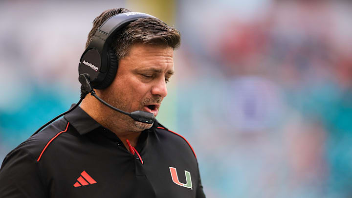 Miami Hurricanes offensive coordinator Shannon Dawson coaches from the sideline prior to the game against the Virginia Cavaliers at Hard Rock Stadium. 