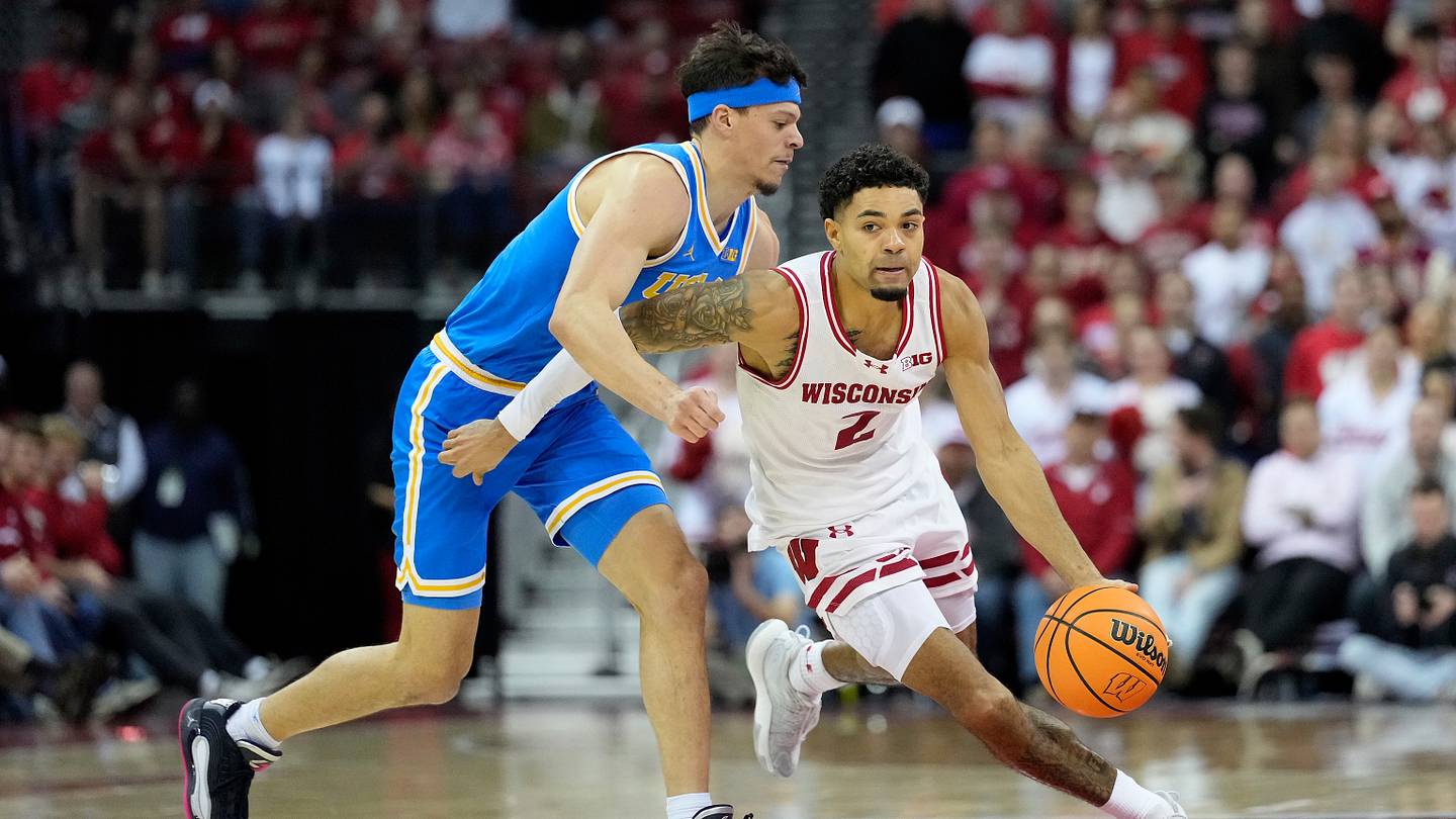 Badgers Seek Upset Against Undefeated Wolverines on January 10