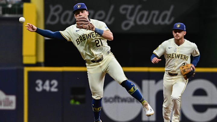 Sep 17, 2025; Milwaukee, Wisconsin, USA;  Milwaukee Brewers third baseman Caleb Durbin (21) throws out Los Angeles Angels third baseman Luis Rengifo (not pictured) in the eighth inning at American Family Field. Mandatory Credit: Benny Sieu-Imagn Images