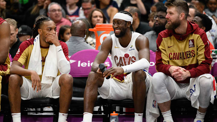 Oct 26, 2024; Washington, District of Columbia, USA; Cleveland Cavaliers guard Caris LeVert (3), guard Darius Garland (10), and forward Dean Wade (32) look on from the bench during the fourth quarter against the Washington Wizards at Capital One Arena. Mandatory Credit: Reggie Hildred-Imagn Images