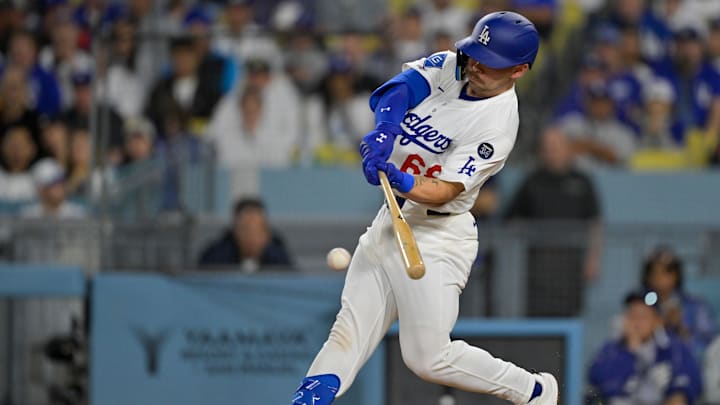 May 15, 2025; Los Angeles, California, USA; Los Angeles Dodgers catcher Dalton Rushing (68) singles against the Athletics during the third inning of the game at Dodger Stadium. Mandatory Credit: Jayne Kamin-Oncea-Imagn Images