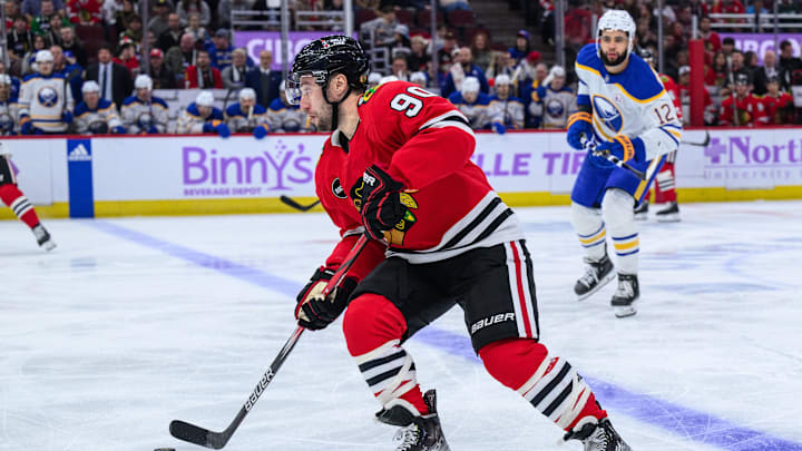 Nov 19, 2023; Chicago, Illinois, USA; Chicago Blackhawks center Tyler Johnson (90) skates with the
