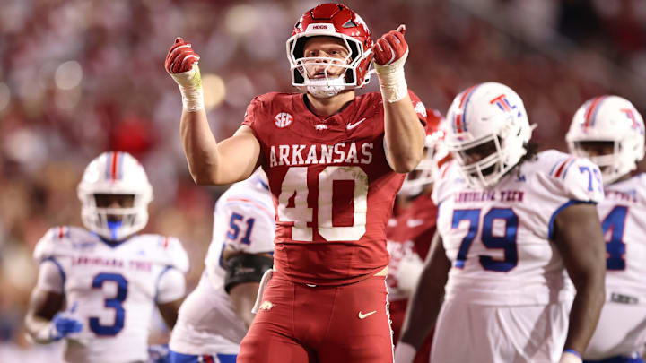Nov 23, 2024; Fayetteville, Arkansas, USA; Arkansas Razorbacks defensive lineman Landon Jackson (40) celebrates after sacking Louisiana Tech Bulldogs quarterback Evan Bullock (7) during the fourth quarter at Donald W. Reynolds Razorback Stadium. Arkansas won 35-14. Mandatory Credit: Nelson Chenault-Imagn Images Nov 23, 2024; Fayetteville, Arkansas, USA; Arkansas Razorbacks defensive lineman Landon Jackson (40) celebrates after sacking Louisiana Tech Bulldogs quarterback Evan Bullock (7) during the fourth quarter at Donald W. Reynolds Razorback Stadium. Arkansas won 35-14. Mandatory Credit: Nelson Chenault-Imagn Images