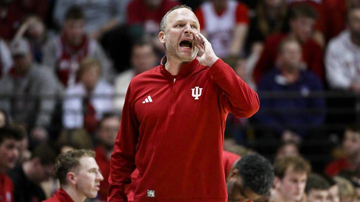 Jan 4, 2026; Bloomington, Indiana, USA; Indiana Hoosiers head coach Darian Devries calls a play against the Washington Huskies during the first half at Simon Skjodt Assembly Hall. Mandatory Credit: Robert Goddin-Imagn Images Jan 4, 2026; Bloomington, Indiana, USA; Indiana Hoosiers head coach Darian Devries calls a play against the Washington Huskies during the first half at Simon Skjodt Assembly Hall. Mandatory Credit: Robert Goddin-Imagn Images