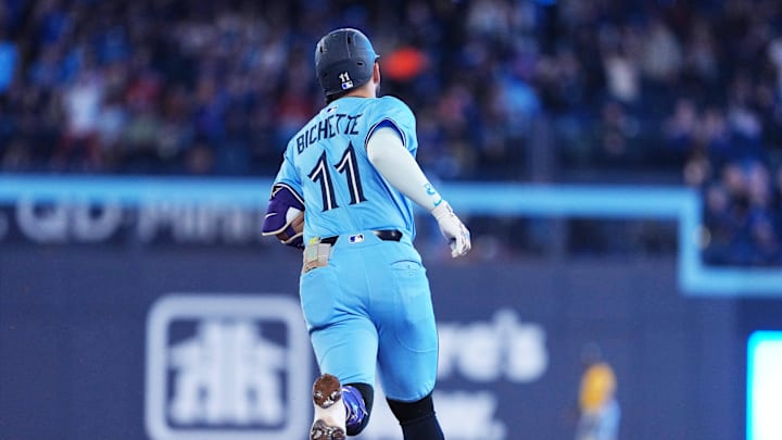 Toronto, Ontario, CAN; Toronto Blue Jays shortstop Bo Bichette (11) runs the bases after hitting his 100th career home run against the Athletics during the second inning at Rogers Centre.