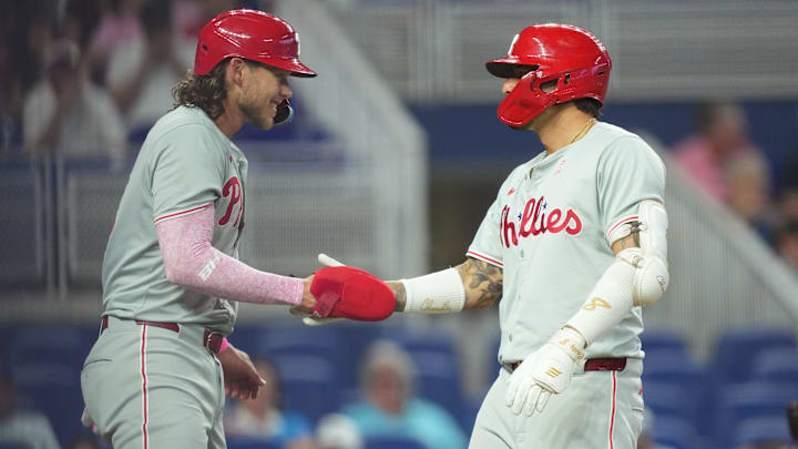 May 12, 2024; Miami, Florida, USA;  Philadelphia Phillies right fielder Nick Castellanos, right, is congratulated by Philadelphia Phillies first baseman Alec Bohm after his three-run home run in the first inning against the Miami Marlins at loanDepot Park.
