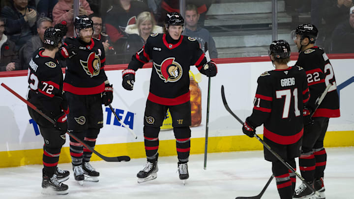 Nov 14, 2024; Ottawa, Ontario, CAN; Ottawa Senators right wing Adam Gaudette (81) celebrates with team his goal scored in the third period againstthe Philadelphia Flyers at the Canadian Tire Centre. Mandatory Credit: Marc DesRosiers-Imagn Images