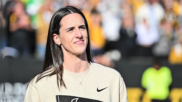 Indiana Fever WNBA star Caitlin Clark is honored during the game between the Iowa Hawkeyes and the Northwestern Wildcats.