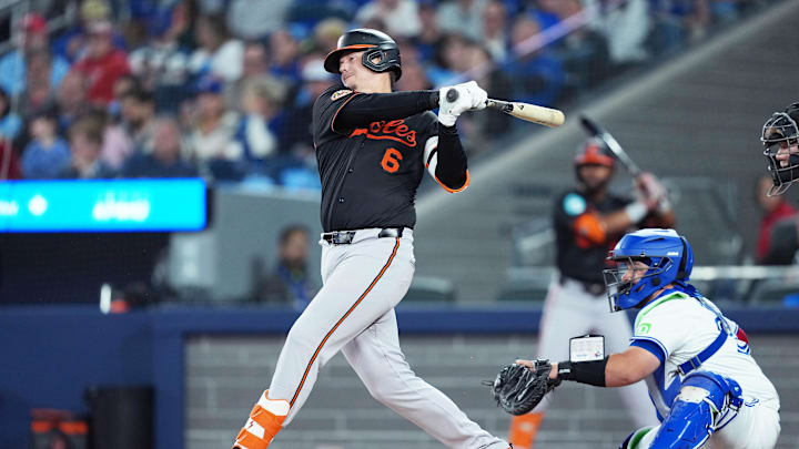 Toronto, Ontario, CAN; Baltimore Orioles first base Ryan Mountcastle (6) hits a double against the Toronto Blue Jays during the second inning at Rogers Centre.
