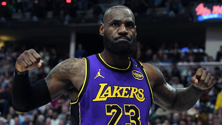 Feb 22, 2025; Denver, Colorado, USA; Los Angeles Lakers forward LeBron James (23) reacts after making a basket and being fouled during the second half against the Denver Nuggets at Ball Arena. Mandatory Credit: Christopher Hanewinckel-Imagn Images