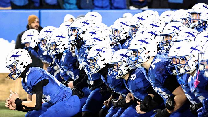 St. Xavier Bombers prepare to take the field during the OHSAA Division I state championship football game between St. Xavier and Olentangy Orange, Friday, Dec. 5, 2025, in Canton.