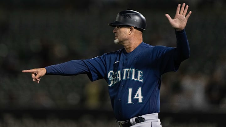 Seattle Mariners third base coach Manny Acta signals during a game against the Oakland Athletics on Sept. 18, 2023, at Oakland Coliseum. Seattle Mariners third base coach Manny Acta signals during a game against the Oakland Athletics on Sept. 18, 2023, at Oakland Coliseum.