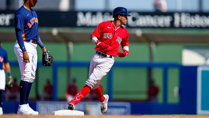 Mar 1, 2023; West Palm Beach, Florida, USA; Boston Red Sox third baseman Ceddanne Rafaela (78) runs into second base against the Houston Astros during the sixth inning at The Ballpark of the Palm Beaches. Mar 1, 2023; West Palm Beach, Florida, USA; Boston Red Sox third baseman Ceddanne Rafaela (78) runs into second base against the Houston Astros during the sixth inning at The Ballpark of the Palm Beaches.