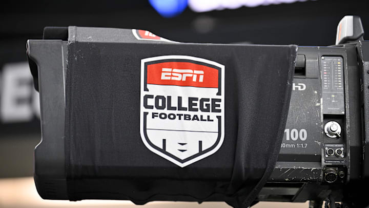 Dec 6, 2025; Arlington, TX, USA; A view of a tv camera and the ESPN college football logo before the game between the Texas Tech Red Raiders and the BYU Cougars at AT&T Stadium. Mandatory Credit: Jerome Miron-Imagn Images