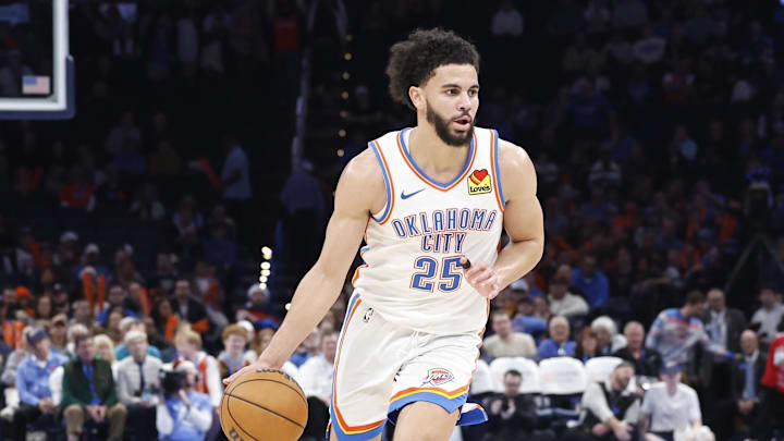 Dec 23, 2024; Oklahoma City, Oklahoma, USA; Oklahoma City Thunder guard Ajay Mitchell (25) dribbles the ball down the court against the Washington Wizards during the second half at Paycom Center. Mandatory Credit: Alonzo Adams-Imagn Images
