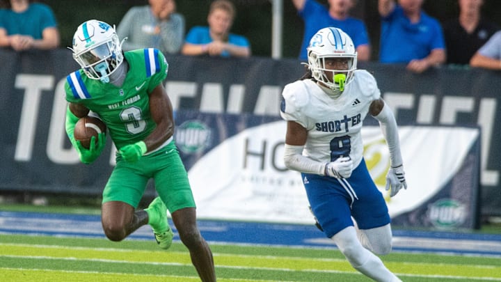 West Florida's Corey Scott runs down field during first half action against Shorter University at the University of West Florida.