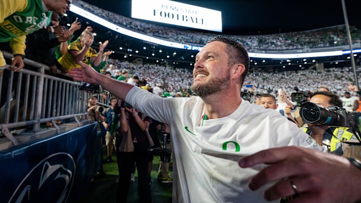 Oregon head coach Dan Lanning celebrates his win with Duck fans as the Oregon Ducks face the Penn State Nittany Lions on Sept. 27, 2025, at Beaver Stadium in University Park, Pennsylvania.