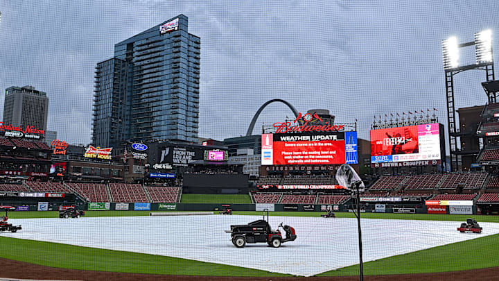 May 8, 2024; St. Louis, Missouri, USA; A general view of the tarp on the field as storms move through the St. Louis region delaying a game between the St. Louis Cardinals and the New York Mets at Busch Stadium. Mandatory Credit: Jeff Curry-Imagn Images May 8, 2024; St. Louis, Missouri, USA; A general view of the tarp on the field as storms move through the St. Louis region delaying a game between the St. Louis Cardinals and the New York Mets at Busch Stadium. Mandatory Credit: Jeff Curry-Imagn Images