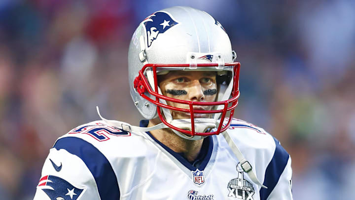 Feb 1, 2015; Glendale, AZ, USA; New England Patriots quarterback Tom Brady (12) against the Seattle Seahawks in Super Bowl XLIX at University of Phoenix Stadium. Mandatory Credit: Mark J. Rebilas-Imagn Images