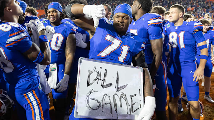 Nov 16, 2024; Gainesville, Florida, USA; Florida Gators offensive lineman Roderick Kearney (71) gestures while holding a sign after a game against the LSU Tigers at Ben Hill Griffin Stadium. Mandatory Credit: Matt Pendleton-Imagn Images